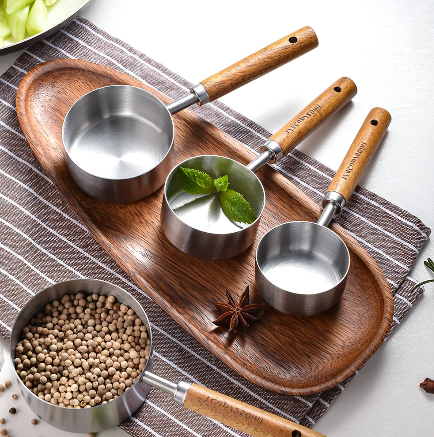 Silver Stainless Steel Measuring Cups: 4 spoons